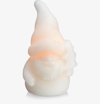 Bild av LED-stearinljus med tomtemotiv för julstämning