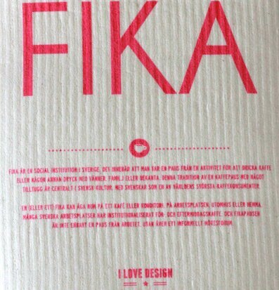 Bild av diskduk med rosa FIKA-design och kaffekopp
