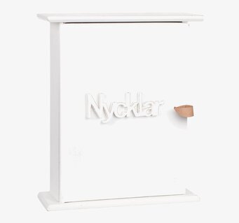 Bild av stilrent nyckelskåp med vit och brun design