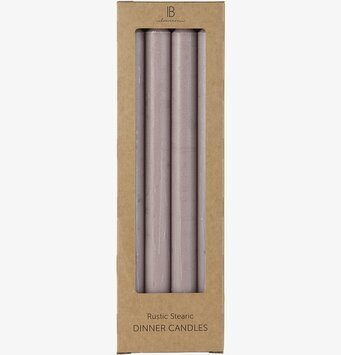 Foto av fyra rosa rustika stearinljus i förpackning