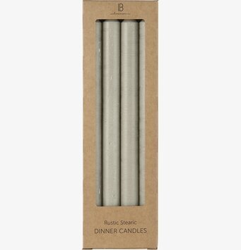 Foto av stilfulla askgrå stearinljus i kartongförpackning