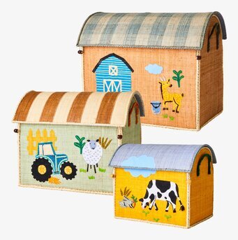 Bild av tre färgglada förvaringslådor med farmtema