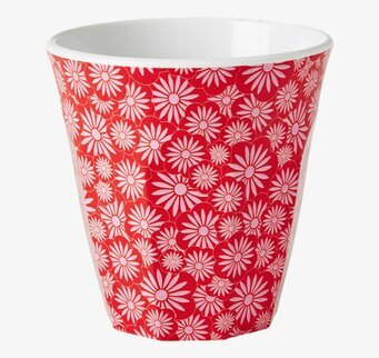 Bild av färgglad mugg med blommönster och vit insida