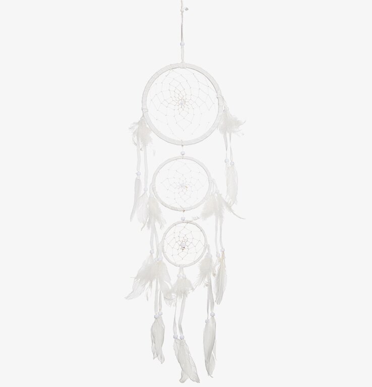 Foto av en vacker vit drömfångare med tre cirklar