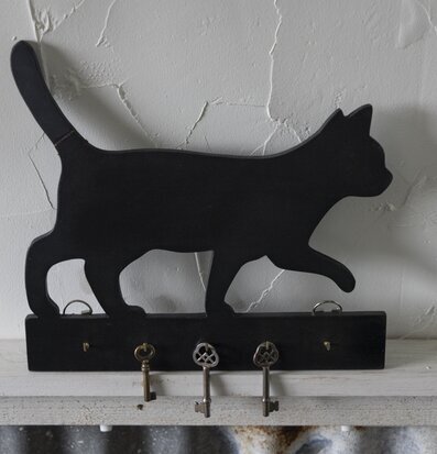Bild av dekorativ hängare med kattmotiv och krokar