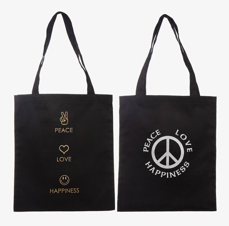 Bild av svart canvasväska med fred, kärlek, lycka