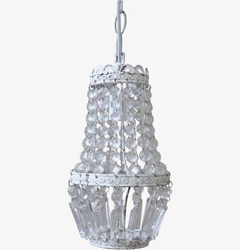 Bild av elegant ljuskrona med antikvit finish