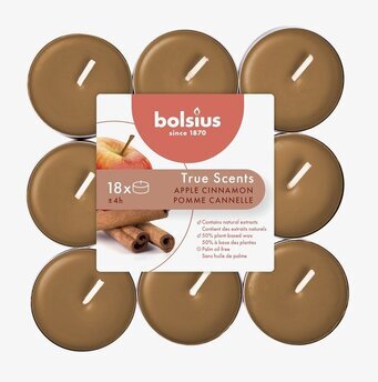 Foto av doftljus med äpple och kanel i top-down-perspektiv