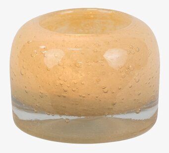 Bild av ljuskopp med bubbelmönster och varm ton