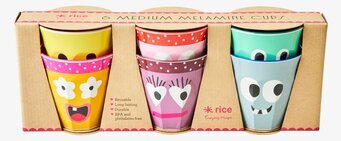 Bild av färgglada och hållbara muggar med ansikten