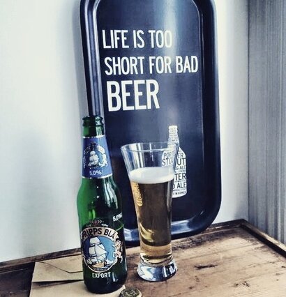 Bild av ölbricka med texten Life is too short...