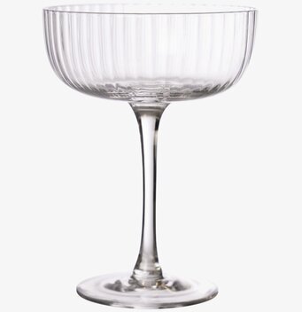 Bild av stilrent dricksglas med texturerad yta