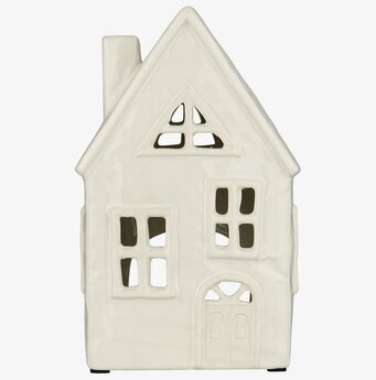 Foto av ljuslykta formad som ett traditionellt hus