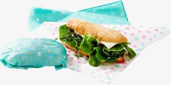 Bild av färgglada smörgåspapper och fylld baguette