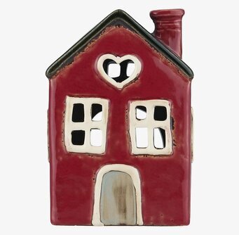 Bild av dekorativ ljuslykta formad som ett rött hus