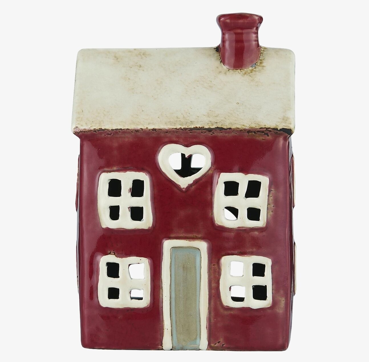 Foto av dekorativ ljuslykta formad som ett hus