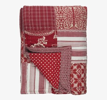 Bild av ett vackert lapptäcke för hemtrevlig inredning