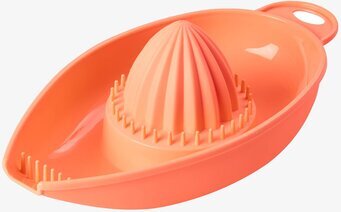 Bild av en lysande orange citruspress i stilren design
