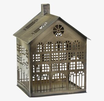 Bild av ljuslykta i antik mässing med husdesign