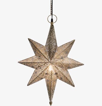 Bild av dekorativ stjärnformad lampa i antik mässing