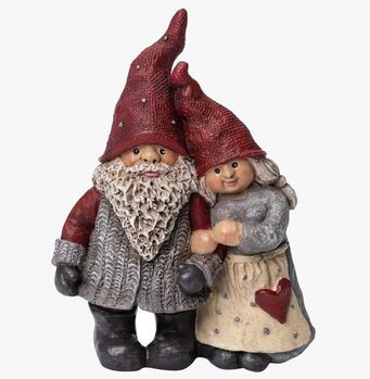 Bild av charmiga tomtefigurer i kärleksfull omfamning