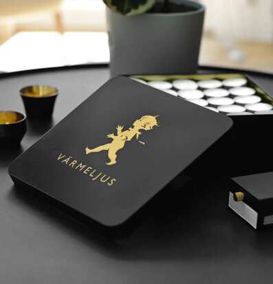 Bild av stilren plåtburk för värmeljusförvaring