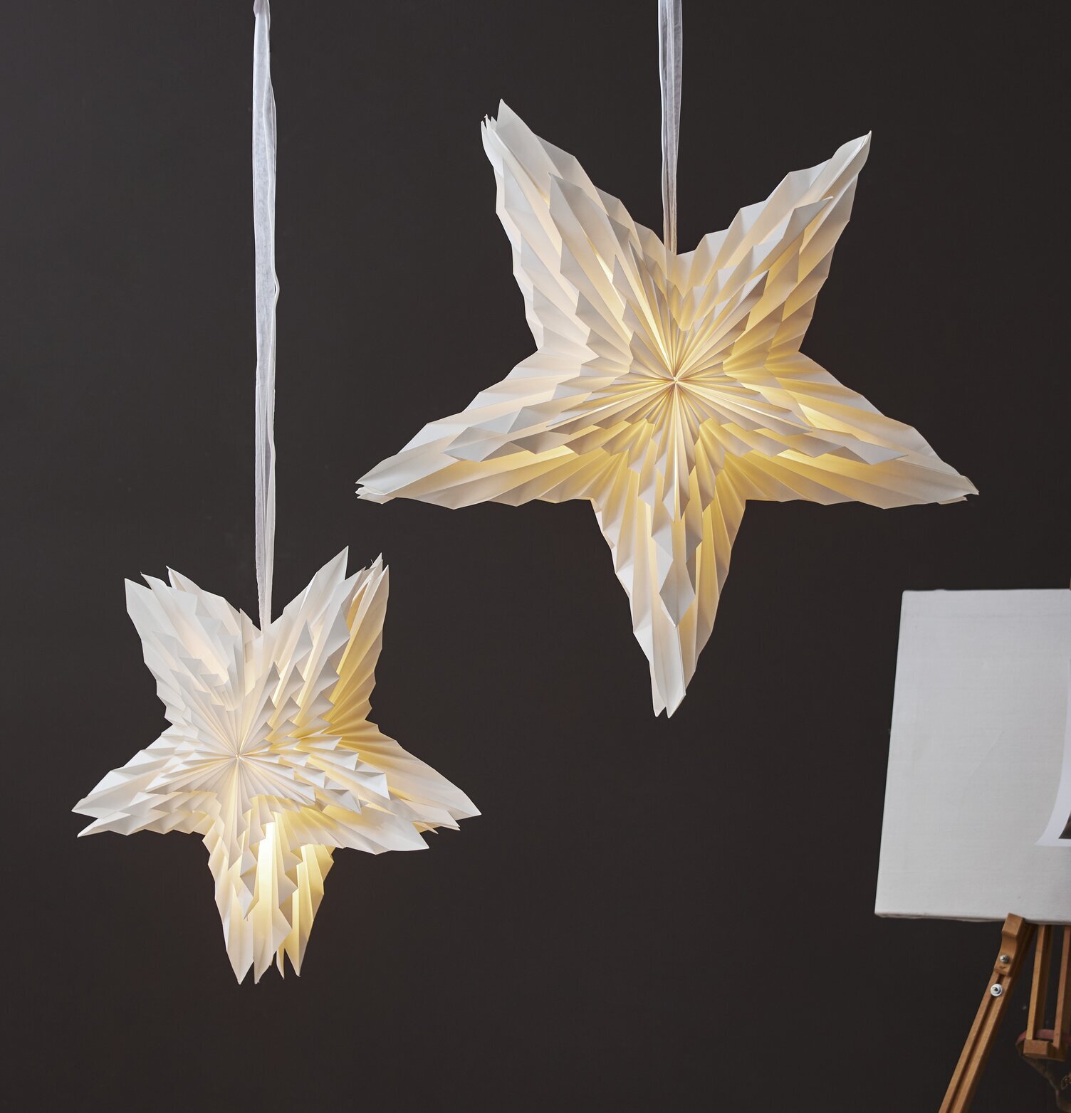 Pappersstjärna White Large från Star Trading upplyst inifrån