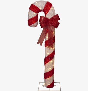 Bild av festlig utomhusdekoration med polkagrisstång