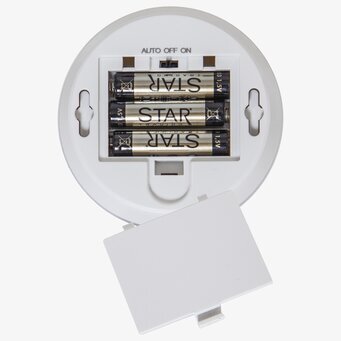 Foto av LED-lampa med batterifack och inställningar