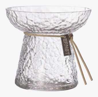 Bild av stilren mönstrad vas i glas med läderdetalj