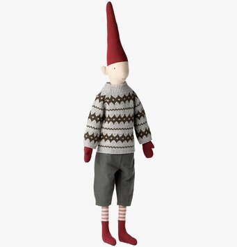 Bild av en charmig docka med klassiskt tomteutseende