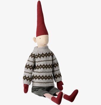 Foto av charmig tygfigur med traditionell design