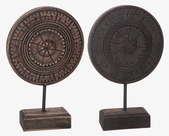 Bild av dekorativa objekt i mörkt trä med cirklar