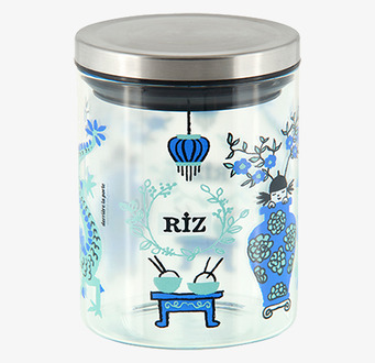 Bild av stilren glasburk för ris med blå dekorationer