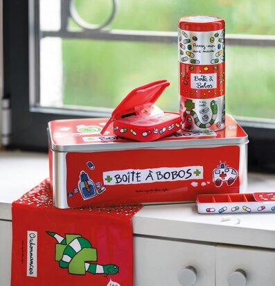 Bild av färgglada plåtburkar för medicinförvaring