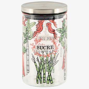 Bild på dekorativ glasburk med papegojor och bladverk