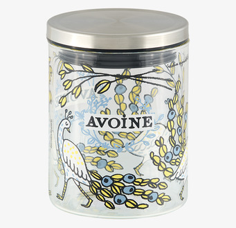 Foto av glasburk med färgglatt mönster och påfåglar