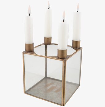 Bild av stilren ljusstake i glas och mässing