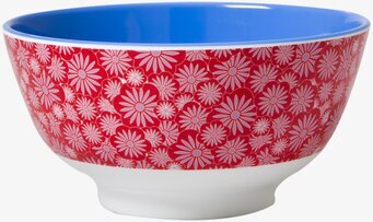 Bild av livfull melaminskål med blommönster och blå insida