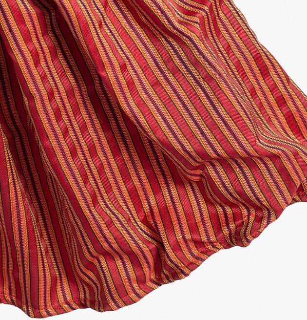 Bordslampa Fredy från Skitso med färgglad randig lampskärm