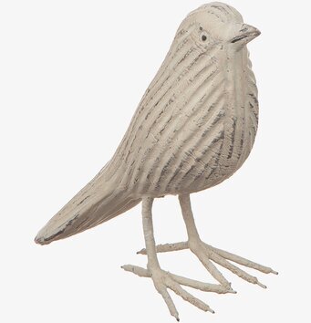 Bild av dekorativ träfågel med naturinspirerad design