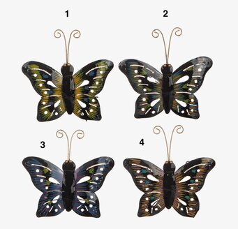 Bild av färgglada fjärilsdekorationer i hamrad plåt