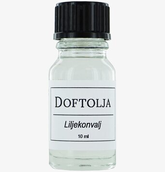 Bild av glasflaska med doftolja och enkel etikett