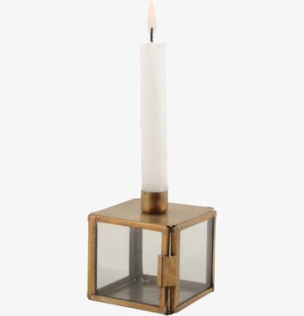 Foto av elegant ljusstake i metall och glas för hemmet