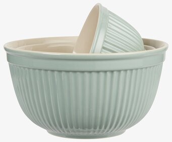 Bild av ett stilrent och funktionellt skålset i grönt