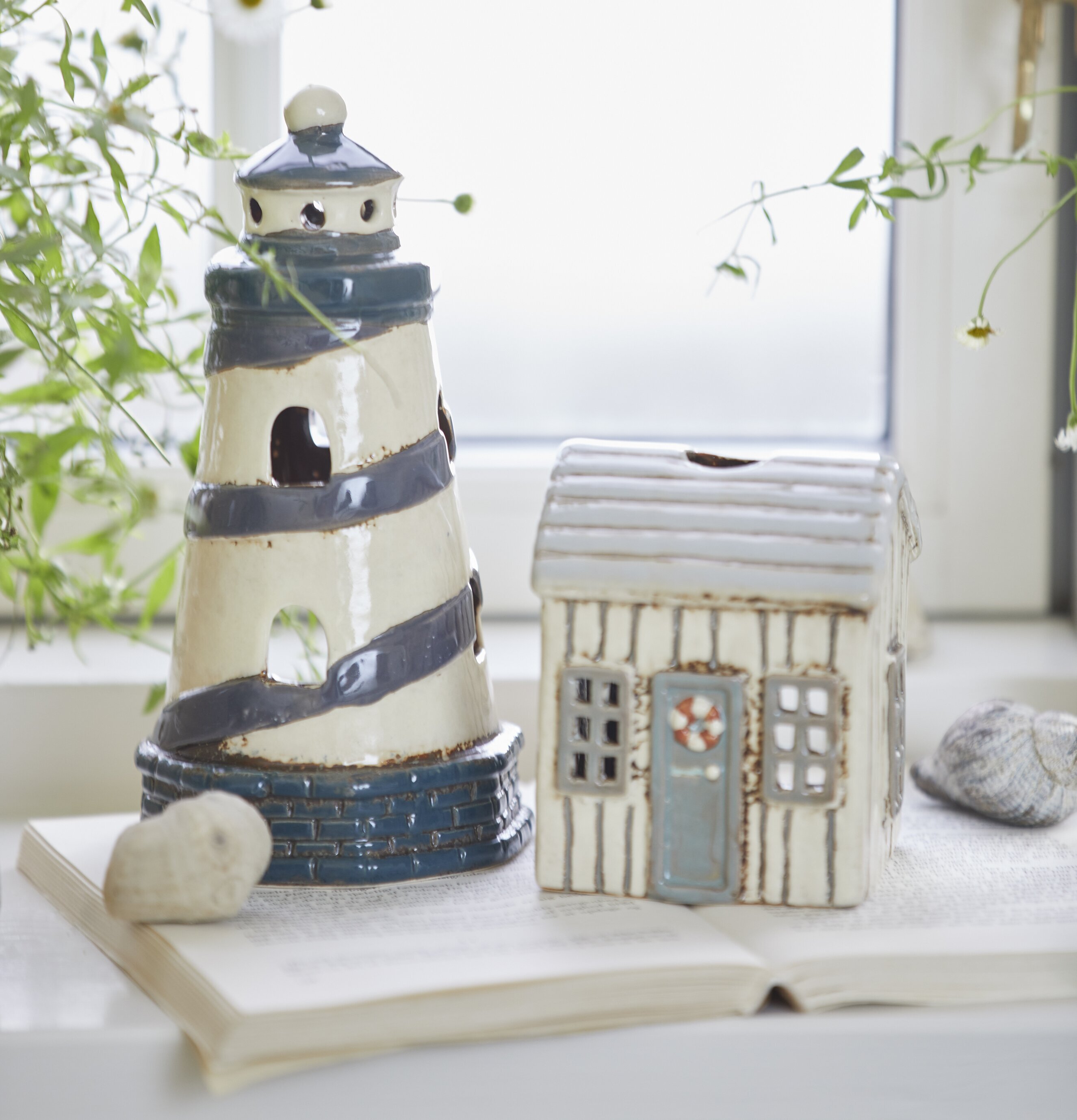 Ljuslykta Fyr Løkken från IB Laursen på fönsterbräda