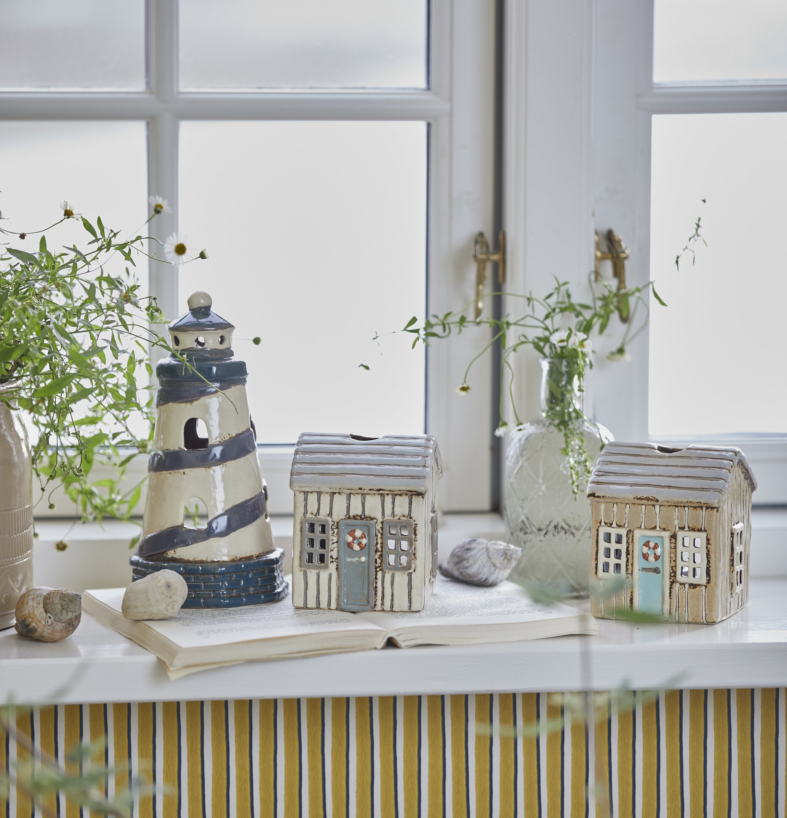 Ljuslykta Fyr Løkken från IB Laursen på fönsterbräda