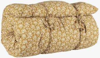 Bild av dekorativ madrass med blommönster och knytband