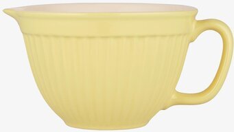 Foto av ljusgul vispskål med elegant design