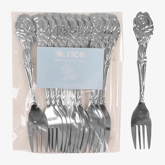 Bild av eleganta tårtgafflar med rosdetaljer